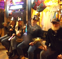 Patrons drink beer right outside Peanut's Bar on Flagler / Headline Surfer